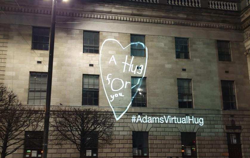 PICS: Adam King’s virtual hug sign the cause for many a smiling face last night