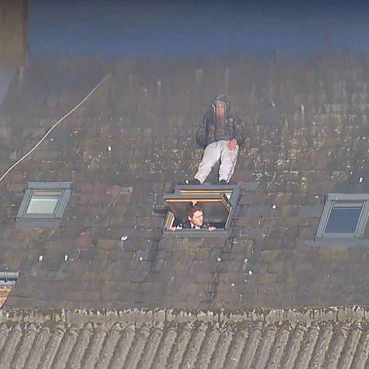 Man tries to avoid police officer by hiding on velux window