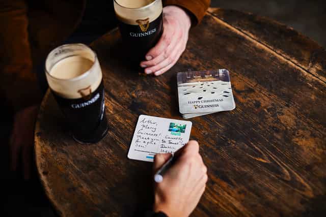 Guinness turning beermats into postcards as part of fantastic Christmas initiative Guinness turning beermats into postcards as part of fantastic Christmas initiative
