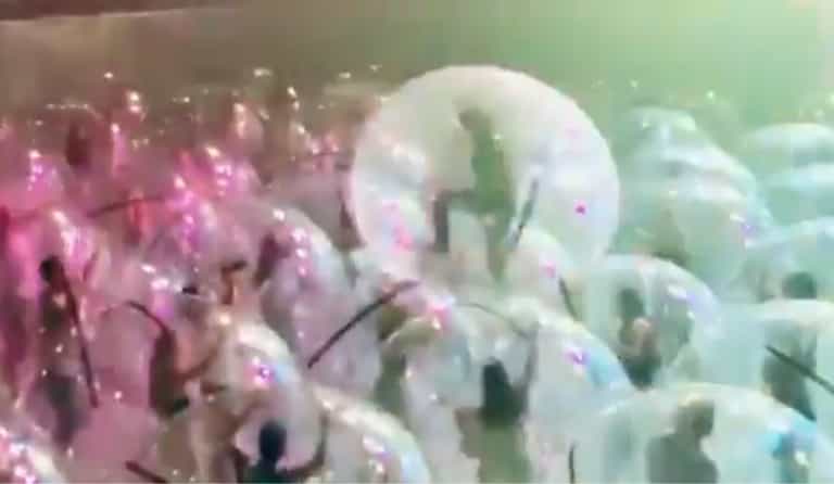 WATCH: The Flaming Lips performed to a crowd in giant inflatable bubbles this week WATCH: The Flaming Lips performed to a crowd in giant inflatable bubbles this week