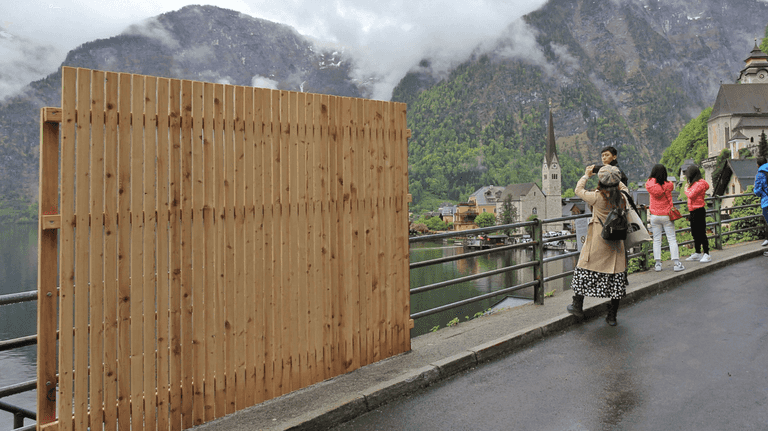 Austrian town builds fence around popular tourist spot to stop selfies Austrian town builds fence around popular tourist spot to stop selfies