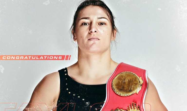 Katie Taylor becomes two-weight world champion with Manchester masterclass Katie Taylor becomes two-weight world champion with Manchester masterclass