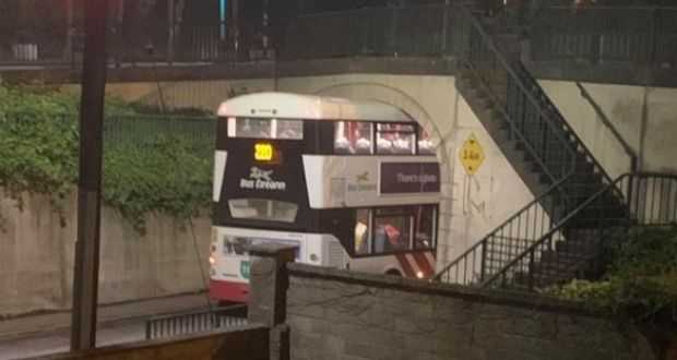 WATCH: Double decker bus in Cork gets jammed under bridge after a wrong turn WATCH: Double decker bus in Cork gets jammed under bridge after a wrong turn